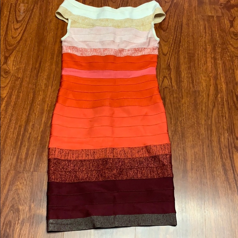 Bandage fitted off the shoulder dress. Size Large.